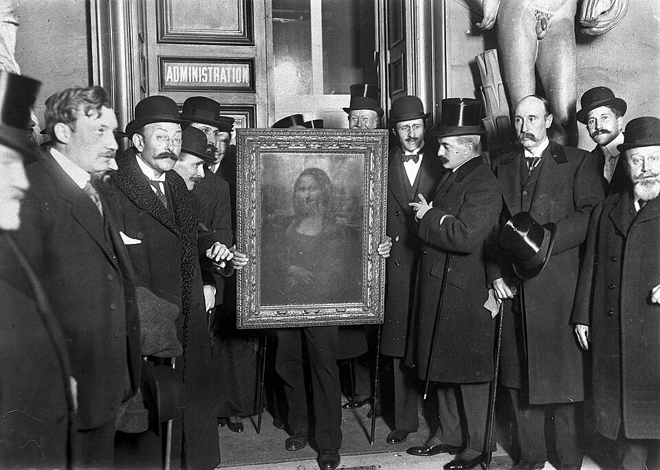 Mona Lisa theft: People gather around the Mona Lisa painting on January 4, 1914 in Paris, France. Photo Roger-Viollet/Getty Images. New York Times.
