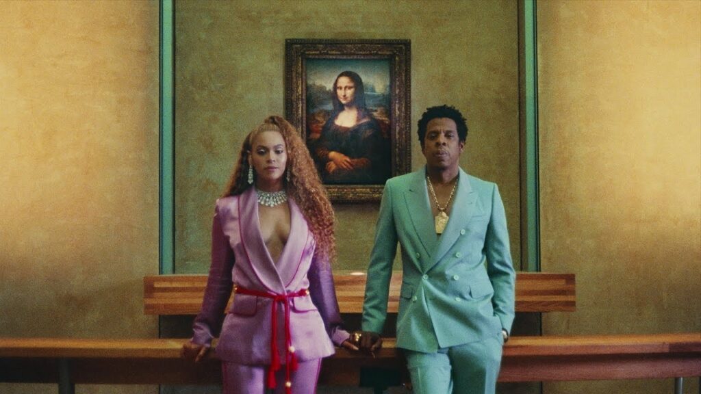 Mona Lisa theft: Beyoncé and Jay-Z in front of Leonardo da Vinci’s Mona Lisa, still from The Carters, APES**T, 2018. YouTube.
