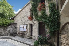 Giovanni Segantini, View of the medieval town of Caglio with a painting, 2008, Caglio (italy).